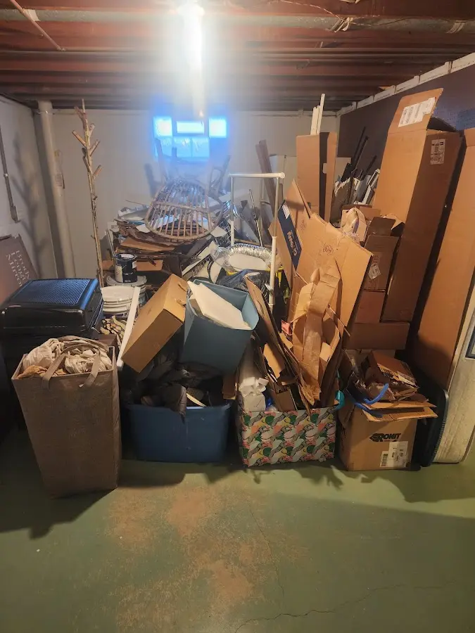 Roll-off dumpster container at job site for 2 Yard Dumpster Rental in Linwood